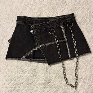 Chic Black Denim Mini Skirt with Chain Accent